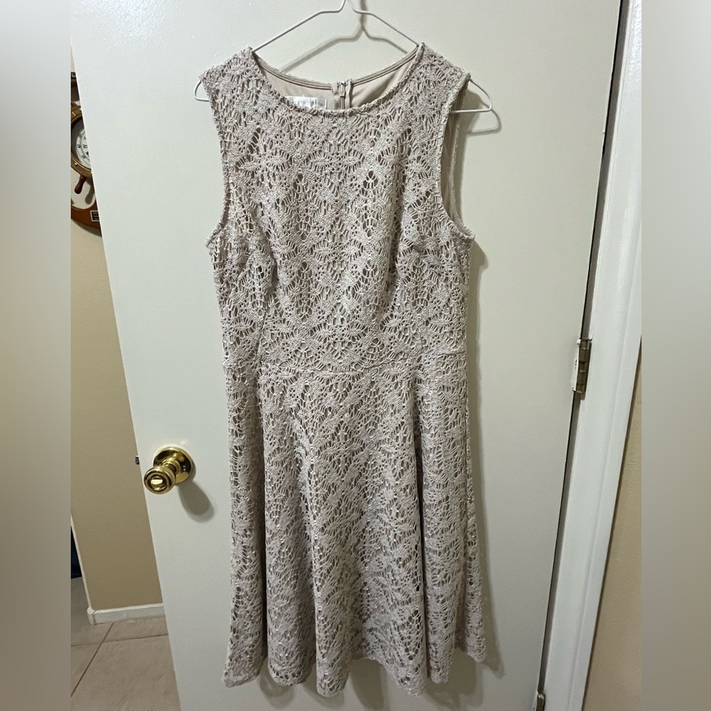 Beige sleeveless dress.